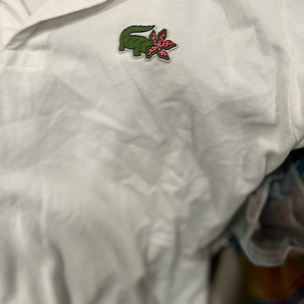 Lacoste White Polo with Stranger Things Logo